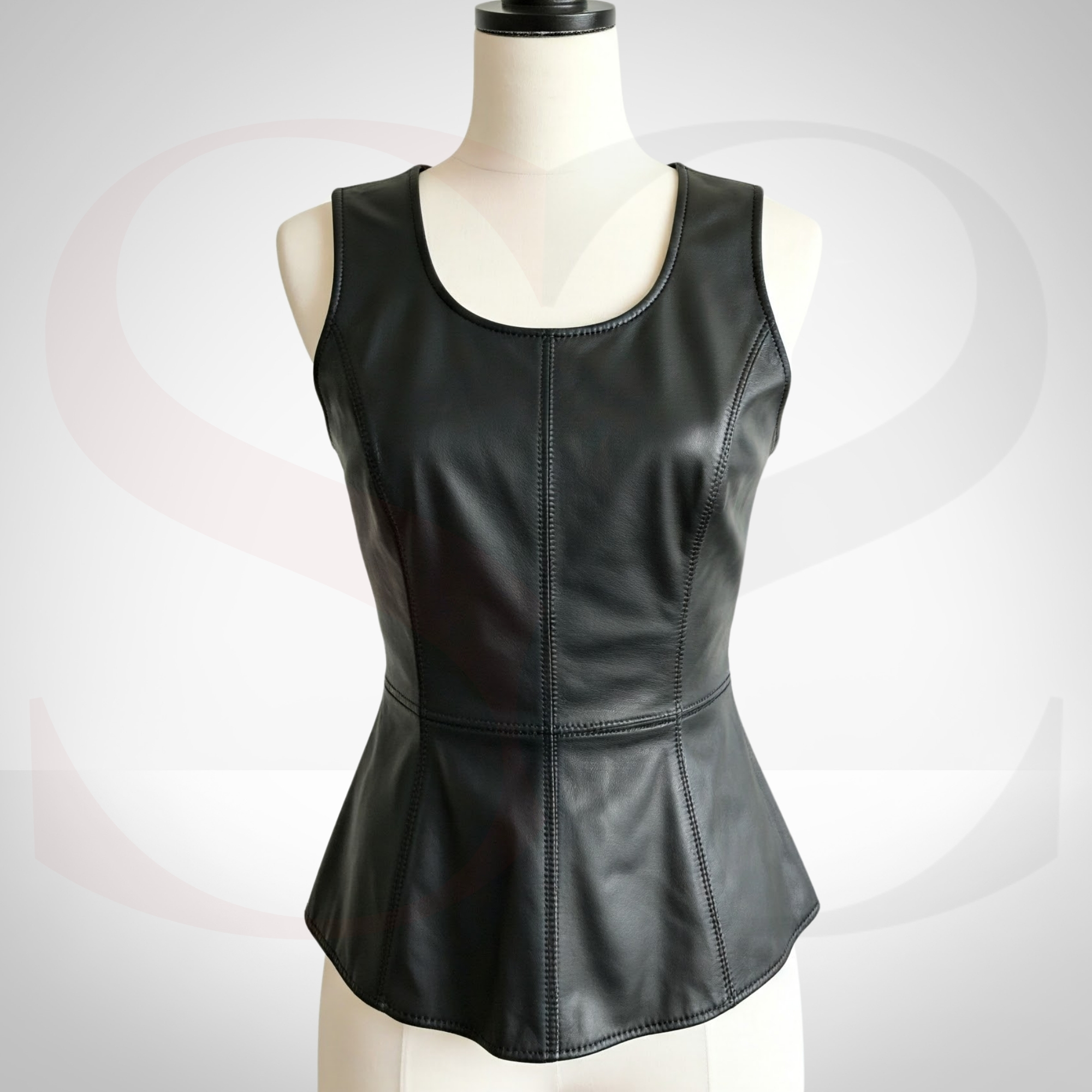 Elevate Curves and Inner Chic With This Black Leather Peplum Top